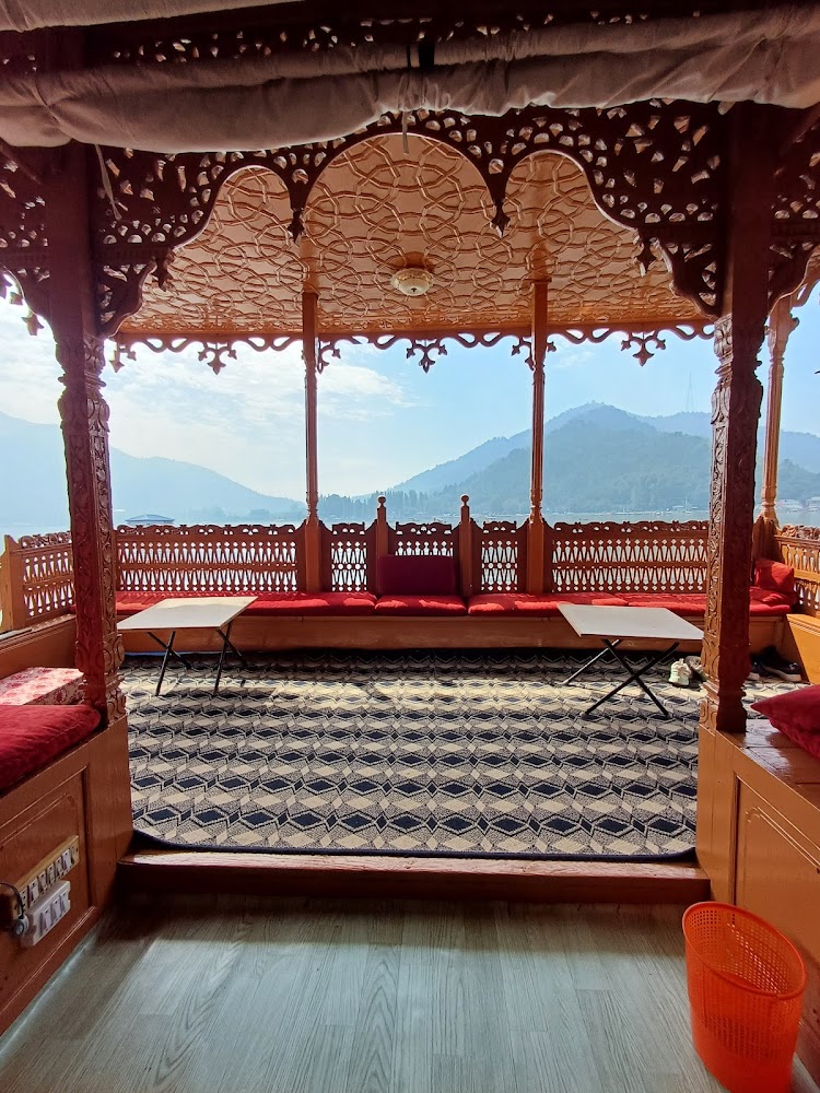 Carved wooden veranda overlooking Dal Lake